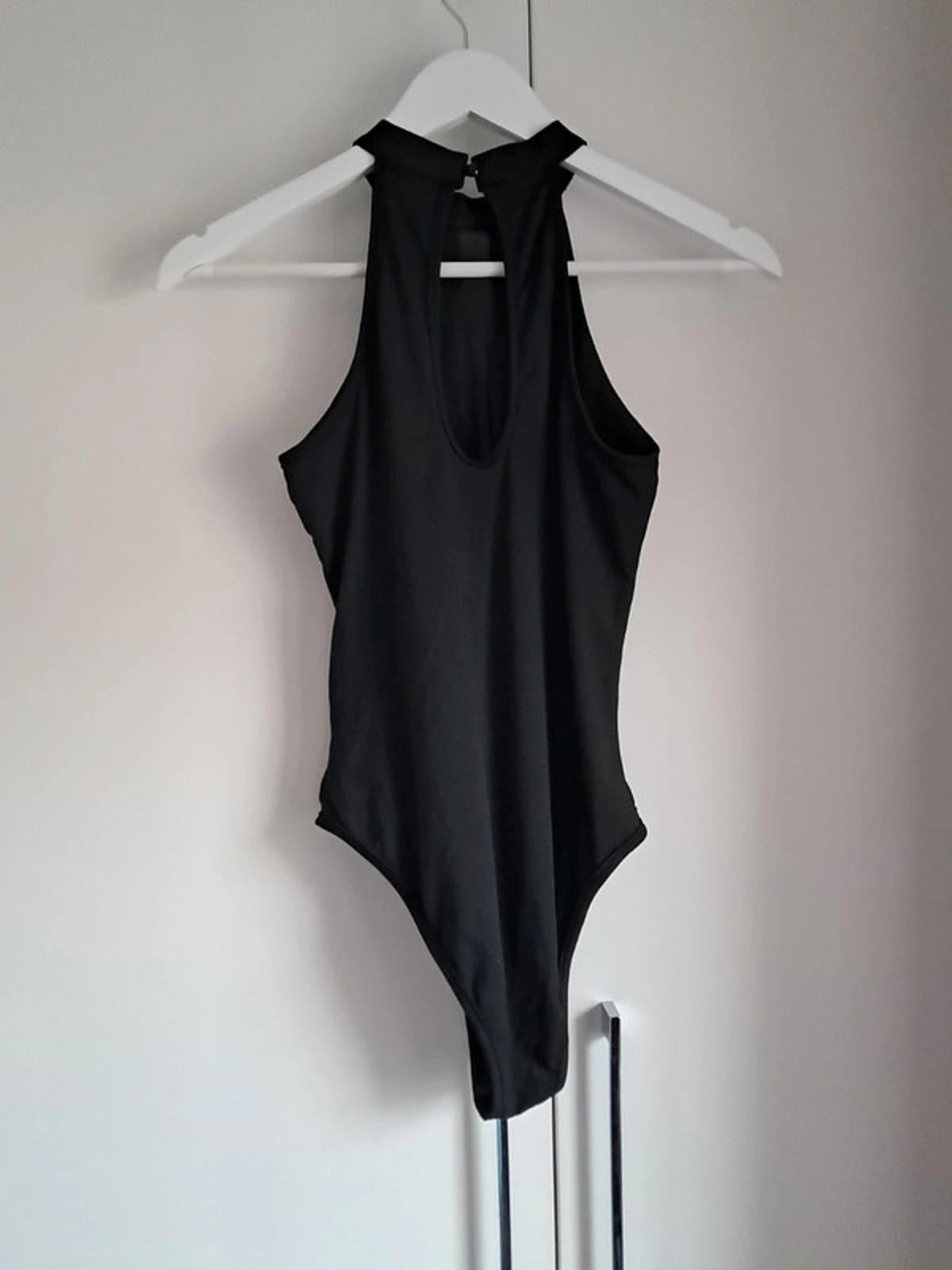Black bodysuit with see through panel