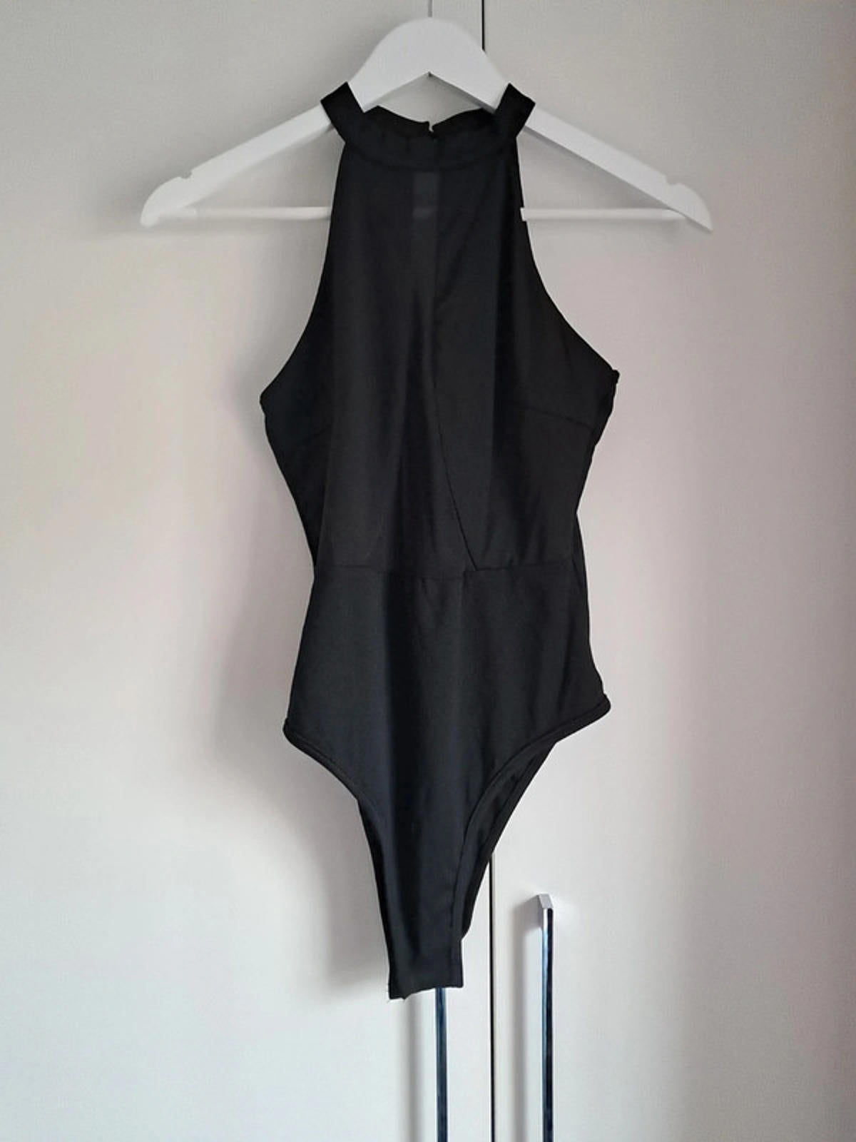 Black bodysuit with see through panel