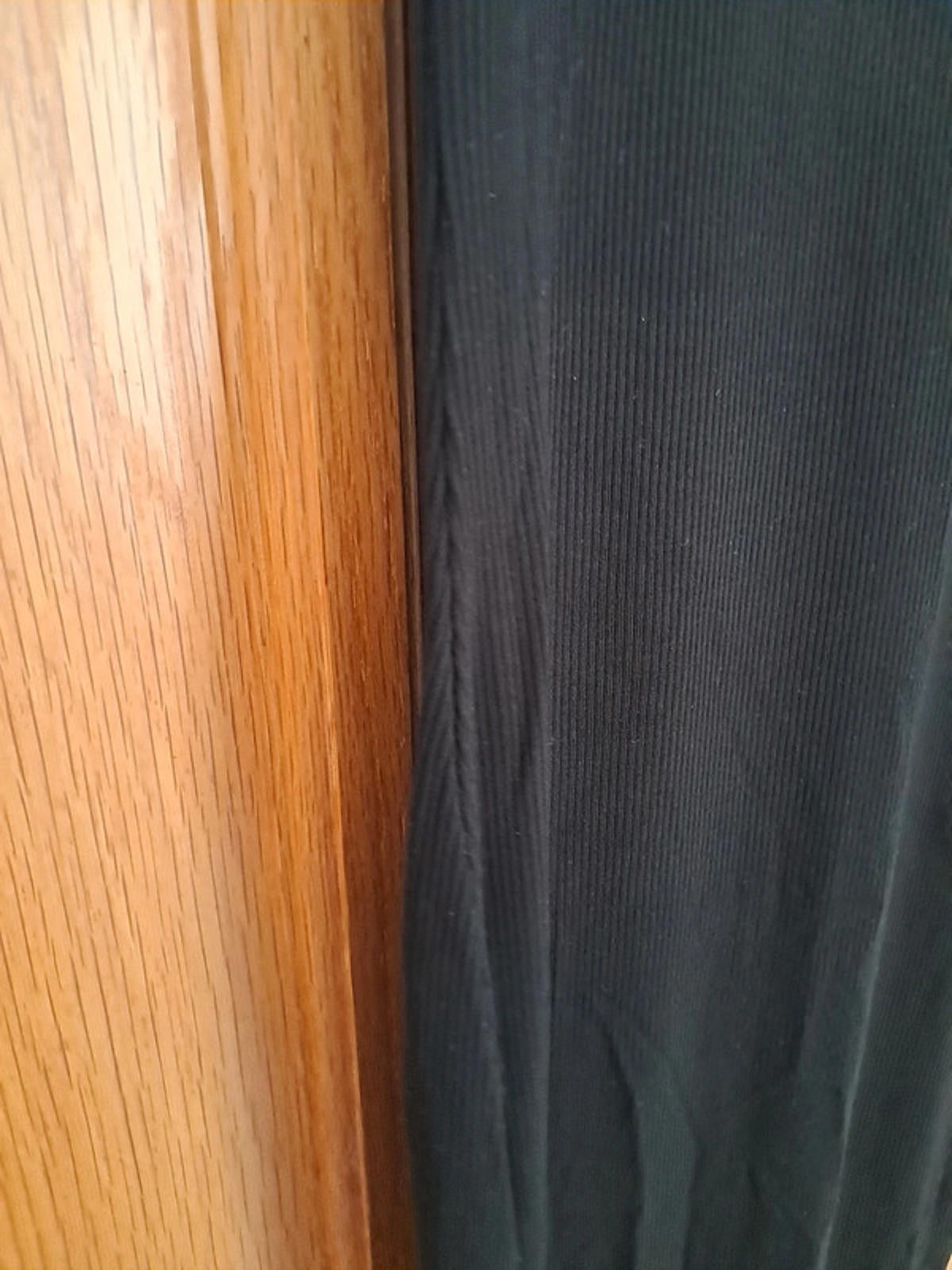 Black sleeveless bodycon dress