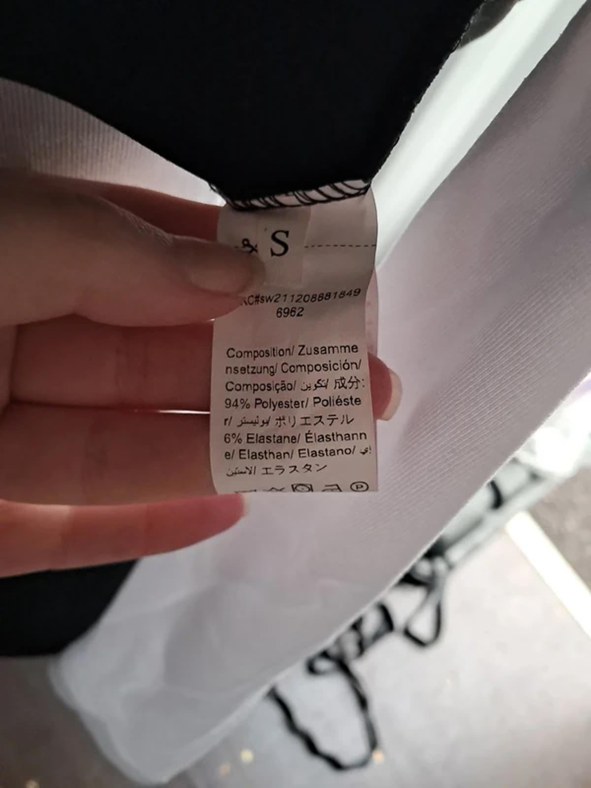 Black bodysuit with see through panel