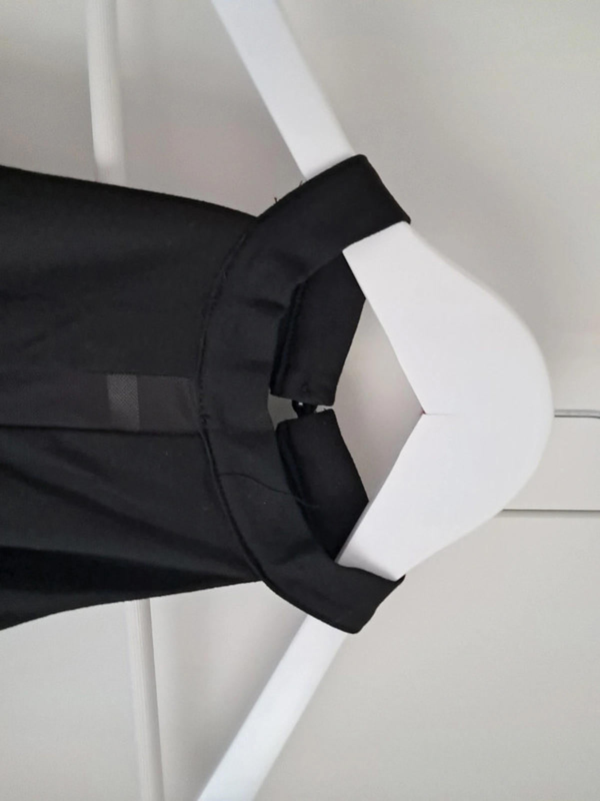 Black bodysuit with see through panel