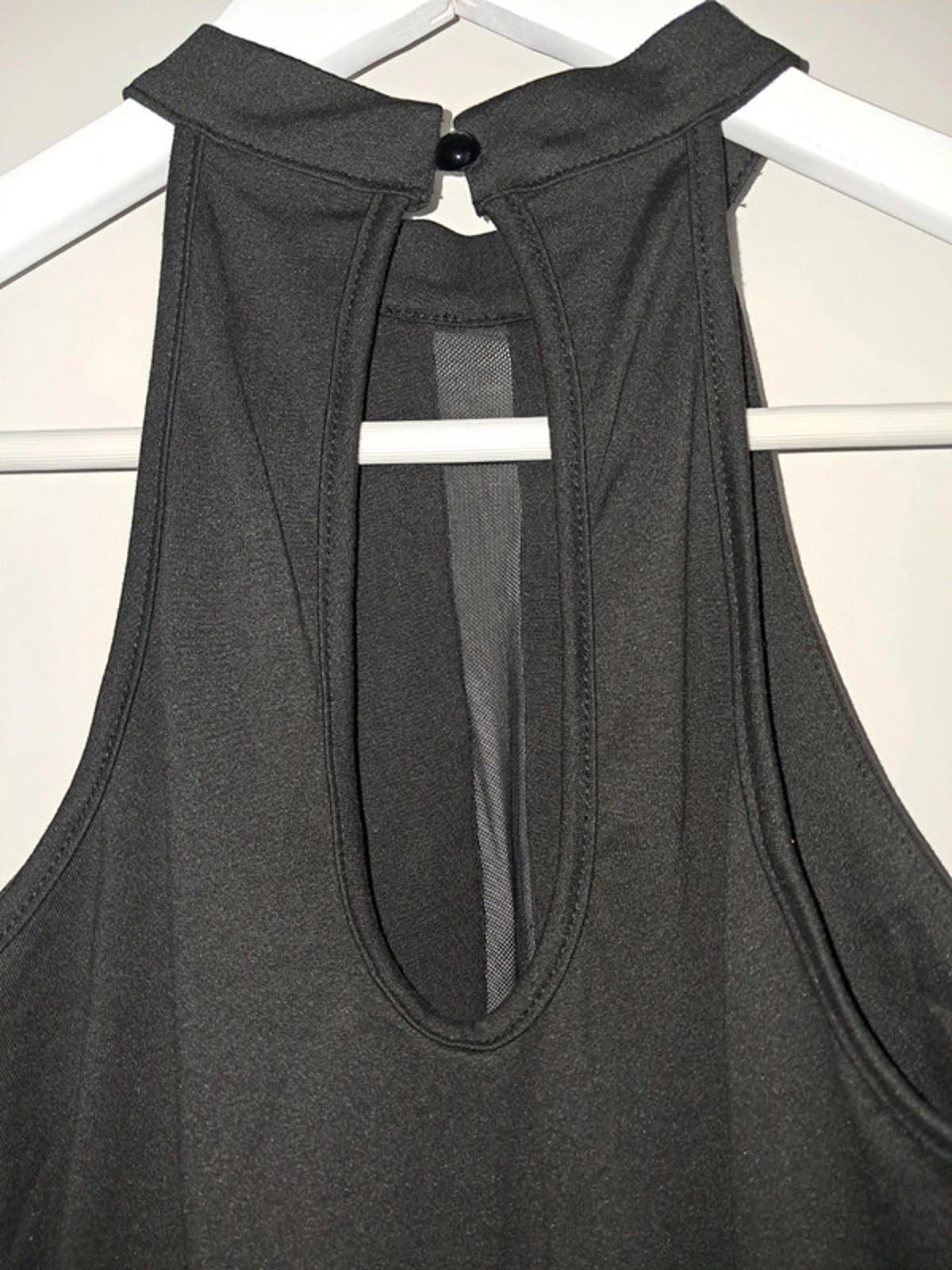 Black bodysuit with see through panel